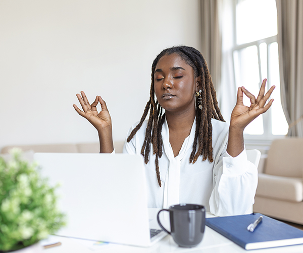 calm-african-female-executive-meditating-taking-break-work-mental-balance-mindful-businesswoman-feeling-relief-no-stress-doing-yoga-work-ignoring-avoiding-stressful-job-copy Zanbest-Our-Vision